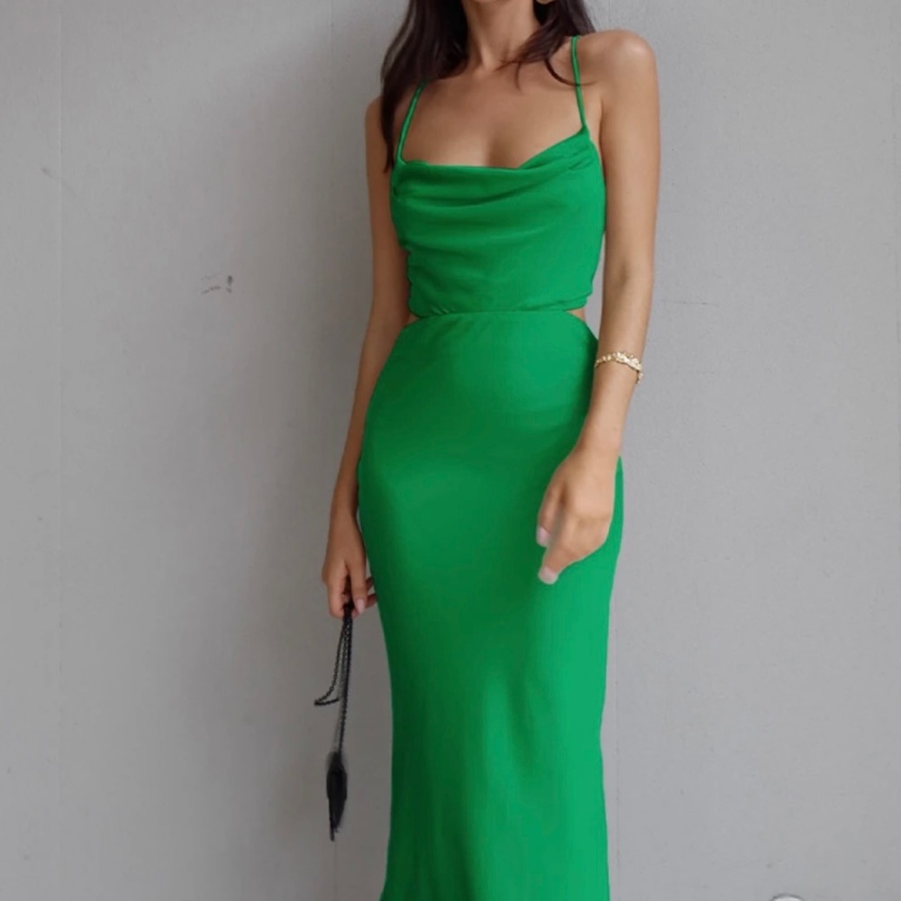 Slip Dress features a cowl neckline. Color Green.